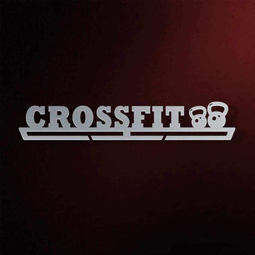 CrossFit Medal Hanger in laser-cut steel on a dark background