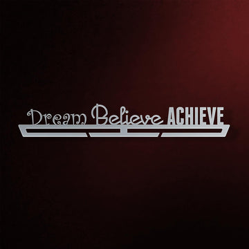 Dream Believe Achieve Medal Hanger in laser-cut steel on a dark background