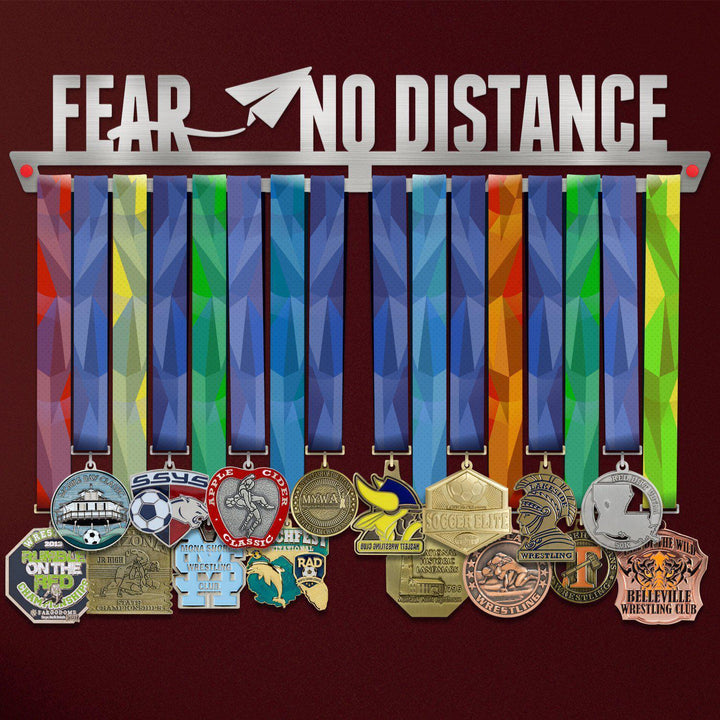 Fear No Distance Medal Hanger V2 holding a full row of medals on a wall