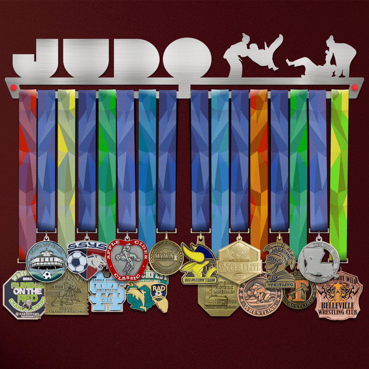 Judo Medal Hanger holding a full row of medals on a wall