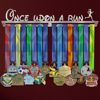 Women's Once Upon A Run Medal Hanger holding a full row of medals on a wall