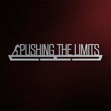Pushing The Limits Medal Hanger V2 in laser-cut steel on a dark background