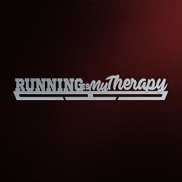 Running Is My Therapy Medal Hanger in laser-cut steel on a dark background